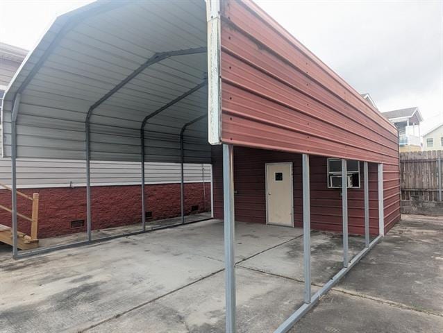 view of outbuilding with a carport