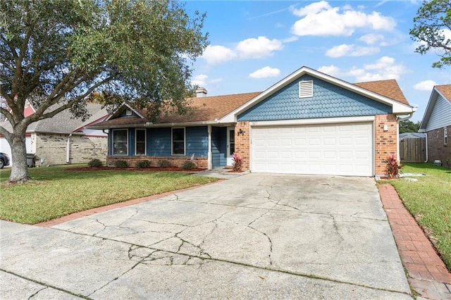 ranch-style house featuring a garage and a front yard