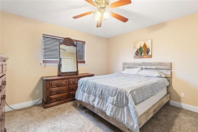 bedroom featuring ceiling fan and carpet floors