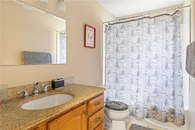 full bathroom featuring vanity, toilet, and shower / tub combo with curtain