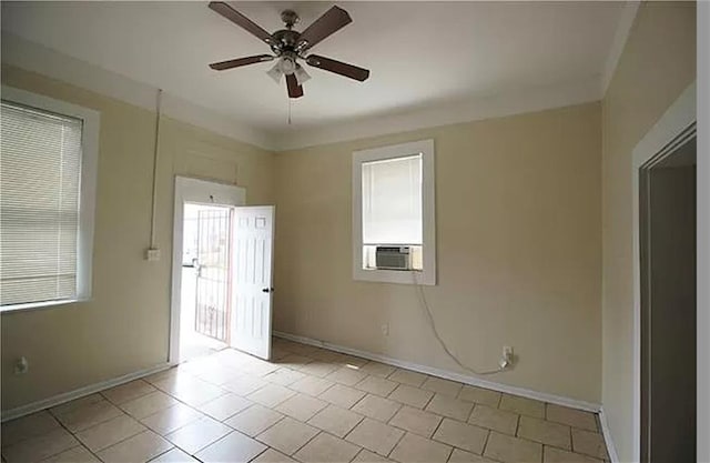 tiled empty room featuring ceiling fan and cooling unit