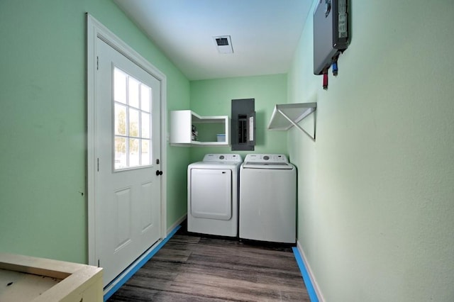 108 Pellegrin St, Chauvin, LA 70344 - laundry room with separate washer and dryer, electric panel, and dark wood-type flooring