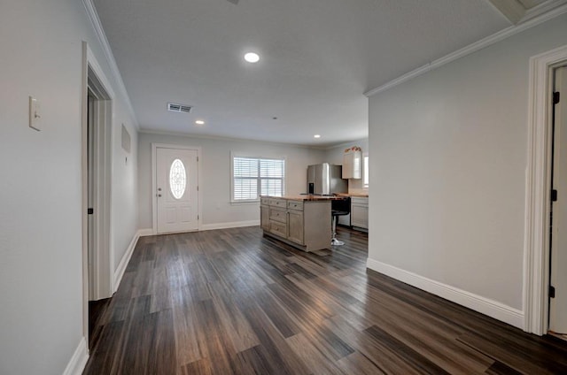 108 Pellegrin St, Chauvin, LA 70344 - foyer entrance with dark wood-type flooring and ornamental molding
