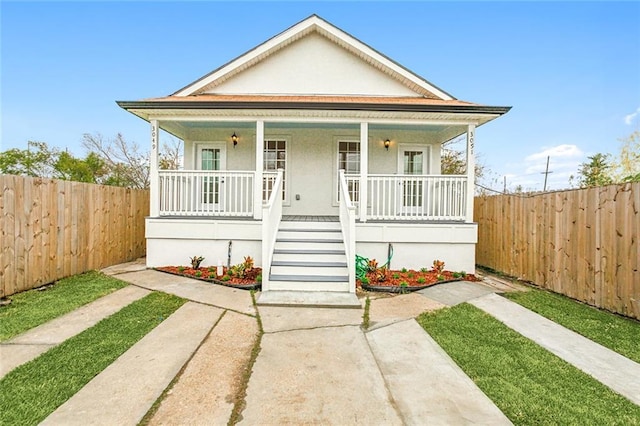 bungalow-style home with covered porch