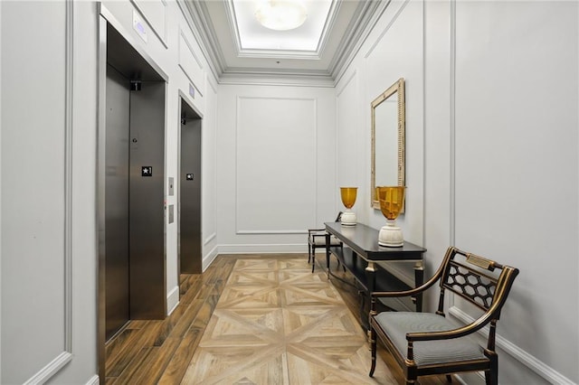 interior space featuring parquet flooring, crown molding, and elevator