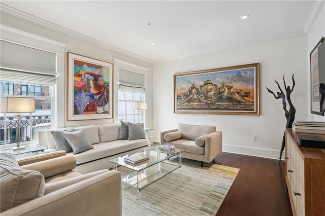 living room featuring dark hardwood / wood-style flooring, ornamental molding, and a wealth of natural light