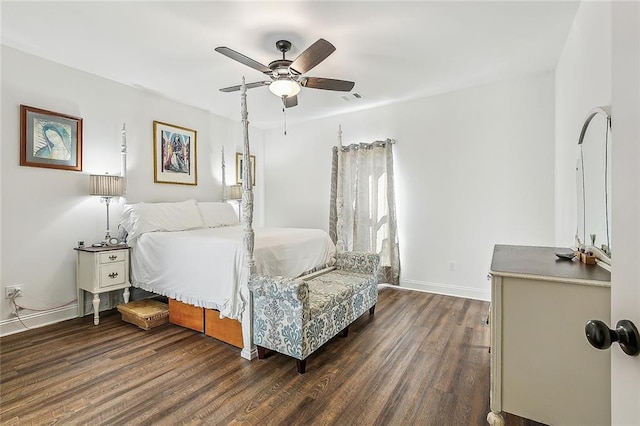 bedroom featuring dark wood-style floors, visible vents, baseboards, and a ceiling fan