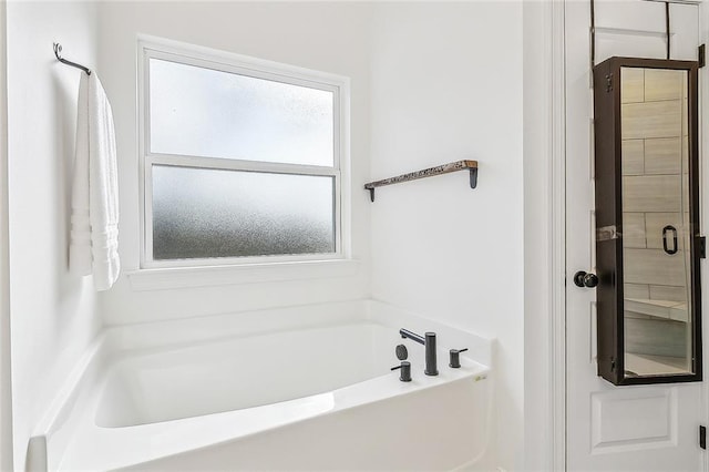 bathroom with a bath