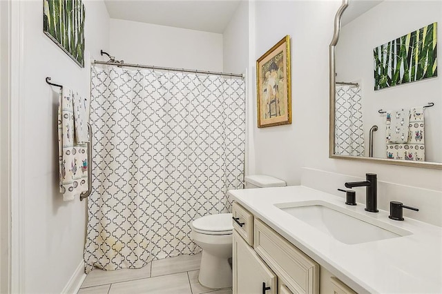 bathroom featuring toilet, a shower with shower curtain, and vanity