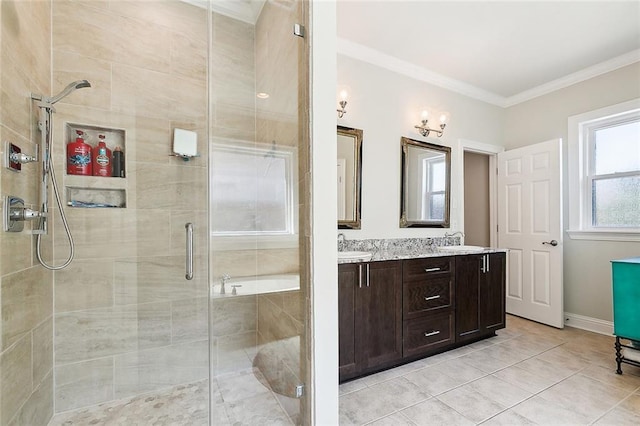 bathroom with crown molding, vanity, tile patterned flooring, and a shower with door