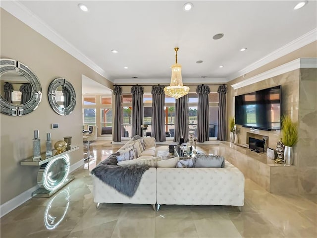 living room featuring a notable chandelier, a fireplace, and crown molding