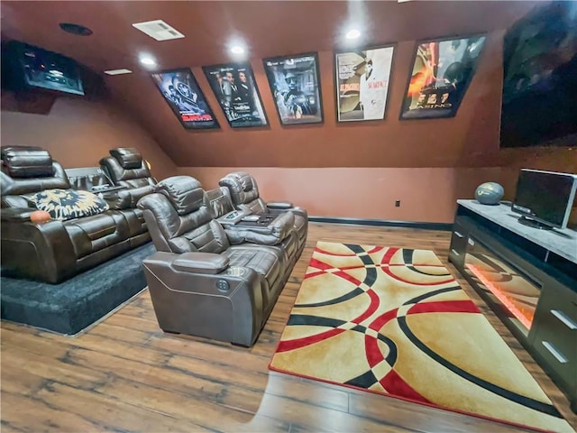 home theater featuring light hardwood / wood-style flooring