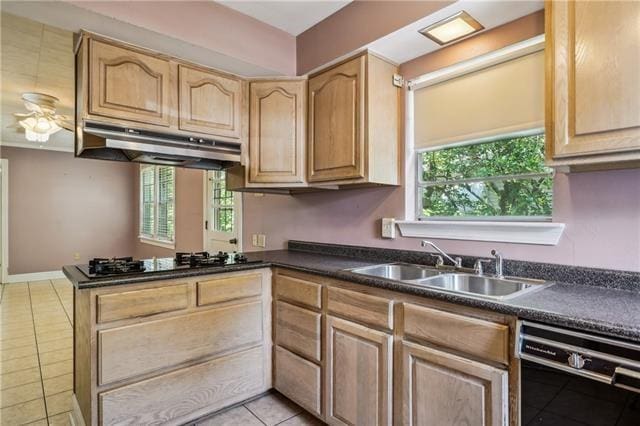 kitchen featuring sink, light tile patterned floors, black appliances, kitchen peninsula, and light brown cabinets