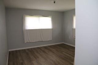 168 Prairieveiw Ct, Avondale, LA 70094 - empty room with wood finished floors and baseboards