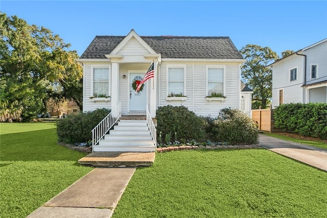 bungalow with a front lawn