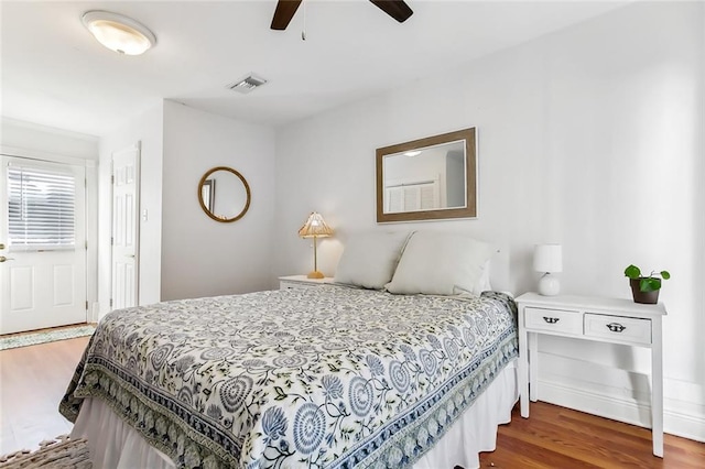 bedroom featuring ceiling fan and wood-type flooring