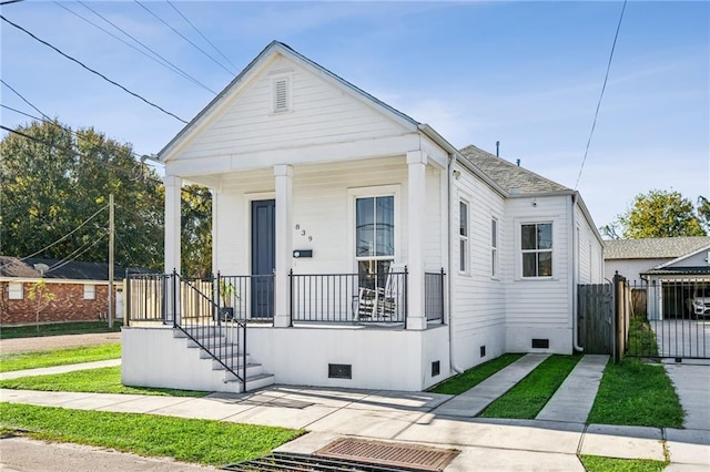 bungalow-style home featuring covered porch