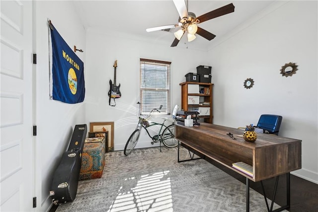 office featuring ceiling fan and ornamental molding