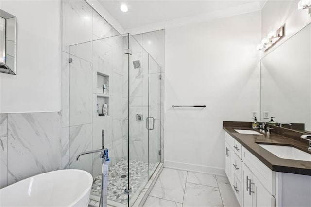 bathroom featuring shower with separate bathtub, vanity, and ornamental molding