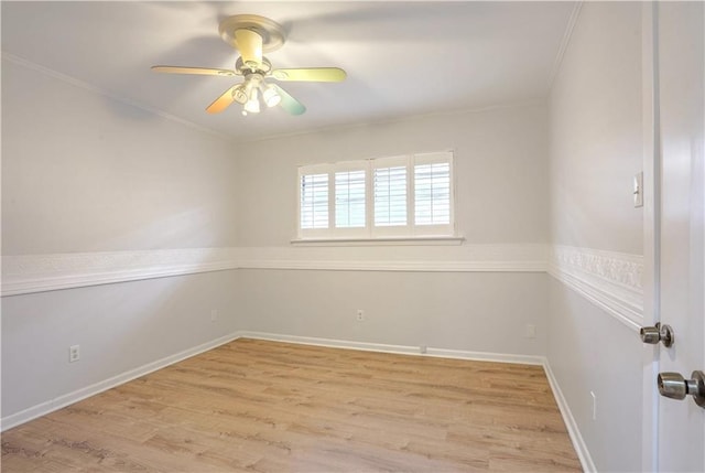 unfurnished room with ceiling fan, ornamental molding, and light wood-type flooring