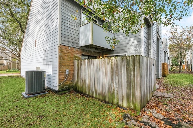 view of side of home with cooling unit