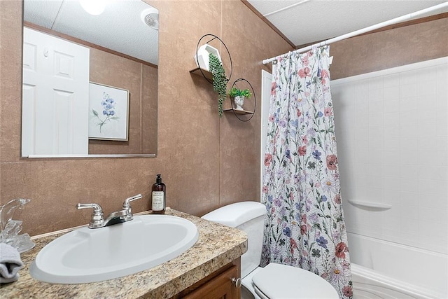 full bathroom featuring shower / tub combo, vanity, a textured ceiling, crown molding, and toilet