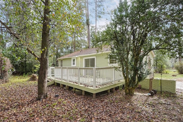 rear view of property with a deck