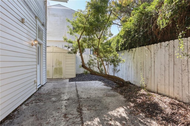 view of patio / terrace with a storage shed