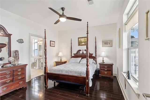 bedroom with ensuite bathroom and ceiling fan