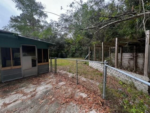 view of yard with a sunroom