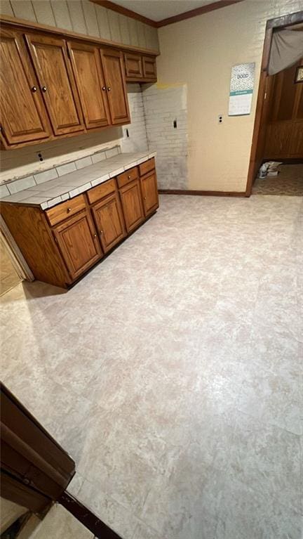 kitchen featuring crown molding