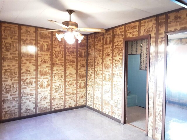 spare room featuring ceiling fan