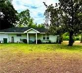 view of front of home with a front yard