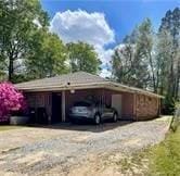 garage with a carport