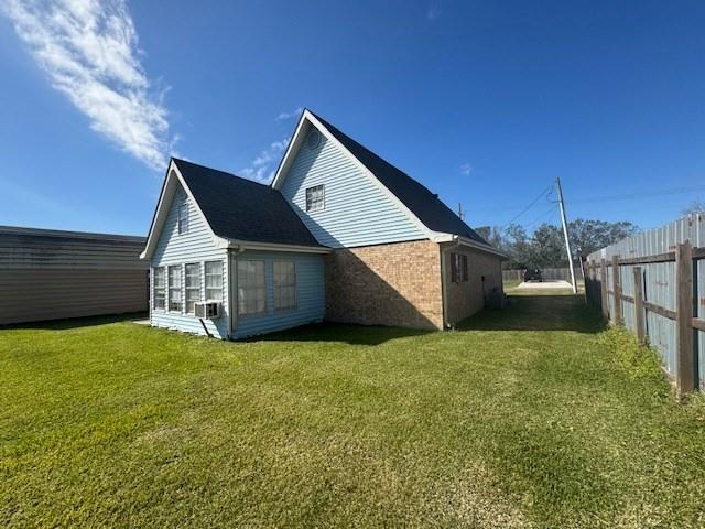 119 Crestwood Dr, Houma, LA 70364 - view of home's exterior with a yard