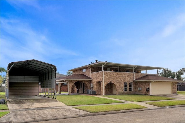 view of front of property with a carport, central AC, and a front lawn