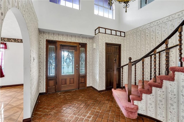 entryway featuring a high ceiling