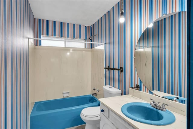 full bathroom with shower / bathing tub combination, vanity, and toilet