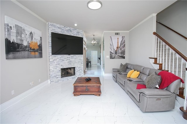 living room with a fireplace, a chandelier, and ornamental molding