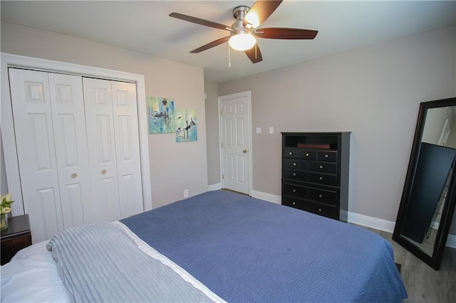 bedroom featuring a closet and ceiling fan