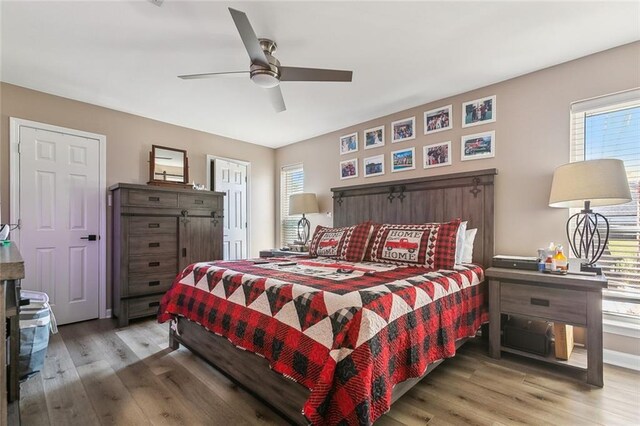 bedroom featuring ceiling fan and hardwood / wood-style flooring