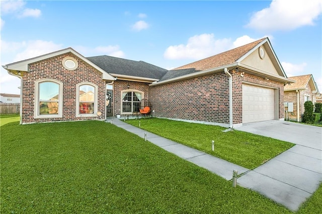 single story home with a front lawn and a garage