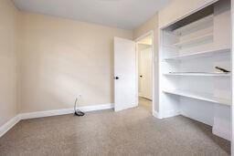 unfurnished bedroom with carpet