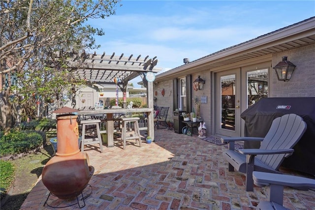 view of patio featuring a pergola