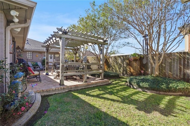 view of yard with a pergola and a patio