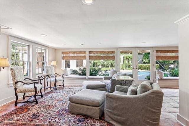 living room with plenty of natural light and french doors