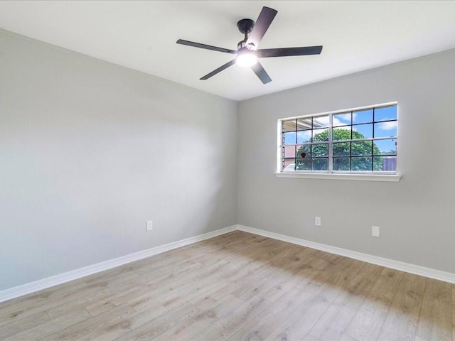 unfurnished room with ceiling fan and light hardwood / wood-style floors