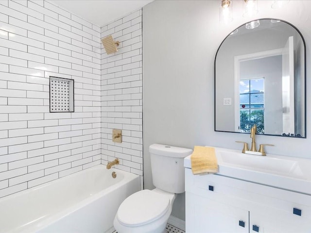 full bathroom with toilet, tiled shower / bath, and vanity