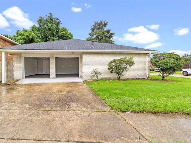 view of side of property with a yard