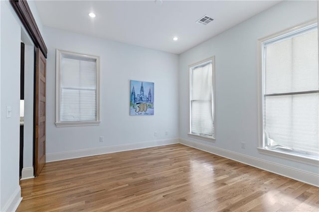 interior space featuring a wealth of natural light and light hardwood / wood-style floors